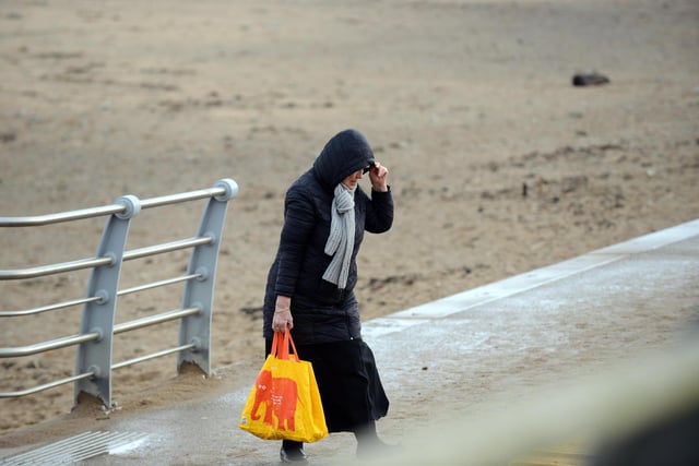 A woman held onto her hood while out in South Tyneside.