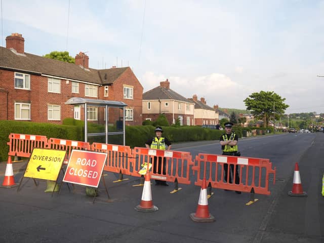 Police officers at the scene in Grimethorpe after more than 100 homes were evacuated in the former pit village after an Army bomb squad was deployed in the wake of a police operation. Picture date: Wednesday May 8, 2024. PA Photo. South Yorkshire Police established a 100-metre cordon around a property in Grimethorpe, Barnsley, on Wednesday morning after "a number of suspicious items" were found as police executed a warrant on Brierley Road. See PA story POLICE Grimethorpe. Photo credit should read: Danny Lawson/PA Wire