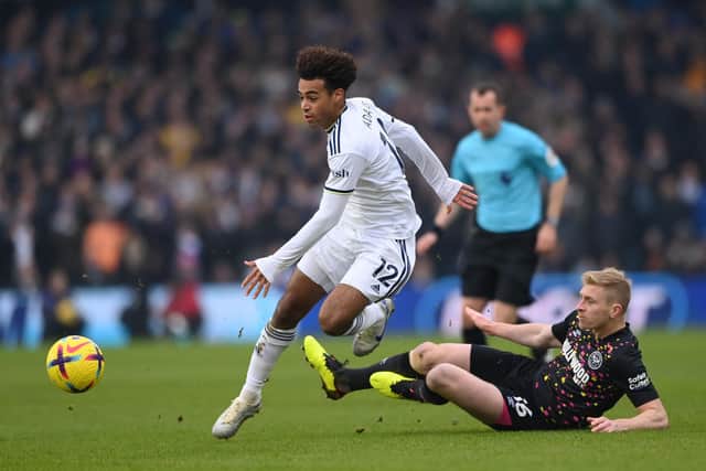 Leeds player Tyler Adams skips the challenge of Ben Mee during the Premier League match between Leeds United and Brentford FC (Picture: Stu Forster/Getty Images)