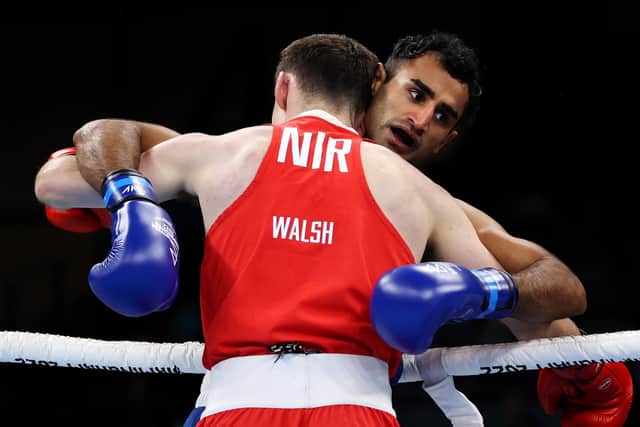 Harris Akbar of Team England and Aiden Walsh of Team Northern Ireland grapple during the Men’s Over 67kg-71kg (Light Middle) - Quarter-Final at the Birmingham 2022 Commonwealth Games (Picture: Robert Cianflone/Getty Images)