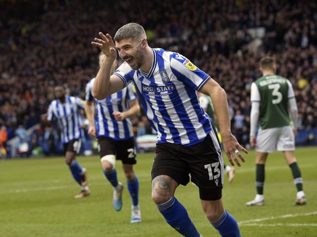 GAME-WINNER: Sheffield Wednesday's Callum Paterson wheels away to celebrate after scoring the game's only goal against League One title rivals Plymouth Argyle, the owls replacing the visitors at top of the standings.
Steve Ellis