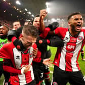 PARTY TIME: Sheffield United players celebrate Oliver Norwood's winning penalty
