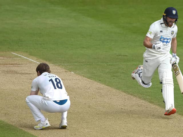 END GAME: Durham's Ben Raine (right) celebrates the winning runs as Yorkshire bowler George Hill reflects on what might have been after the hosts won the County Championship clash by just one wicket at the Seat Unique Riverside Picture: Stu Forster/Getty Images