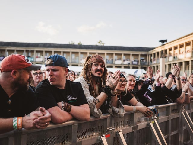 Fans at the barrier, including a familiar face