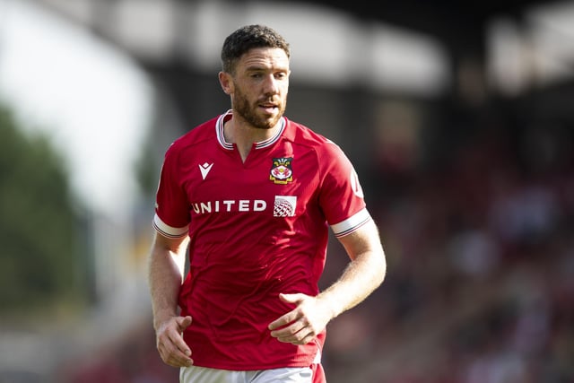 The defender helped Wrexham seal promotion to League One but has been released by the Red Dragons.