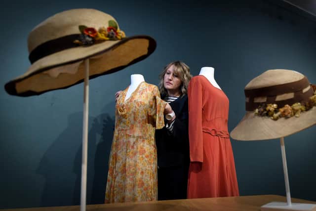 Wedding dresses from the ages exhibition at Ryedale Folk Museum, Hutton-le-Hole, Kirkbymoorside. Director of the Museum Jennifer Smith is pictured with a Bride and Bridesmaid dress from the 1930's from the village of Beadlam..Picture by Simon Hulme