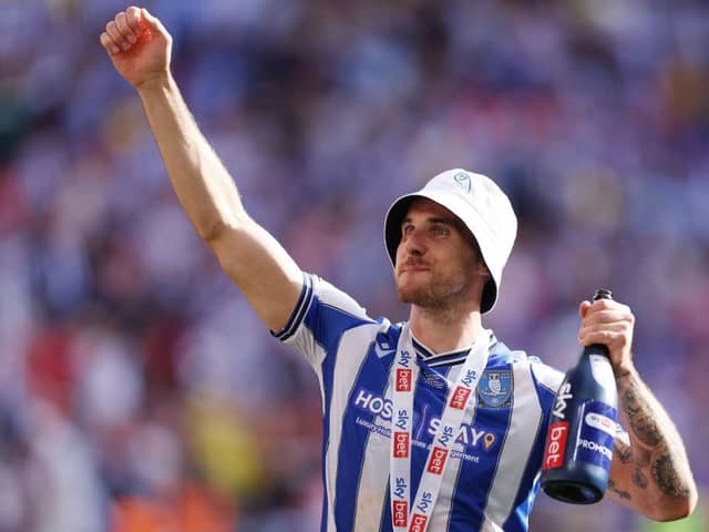 MOVING ON: Lee Gregory celebrates winning promotion from League One with Sheffield Wednesday, something he is now looking to do with Mansfield Town