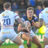 James McDonnell takes the ball in against Wakefield Trinity. (Picture by Steve Riding)