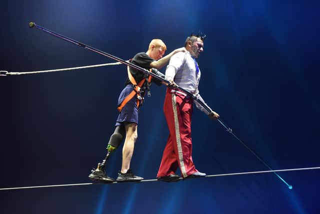 Nathan Bland with the Circus Extreme high wire team