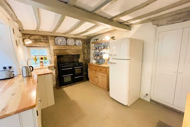 The kitchen with a double Rangemaster electric oven and hob