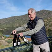 Adrian Bridge, CEO of Taylor Fladgate sets up a port tasting by the Douro. © Christine Austin