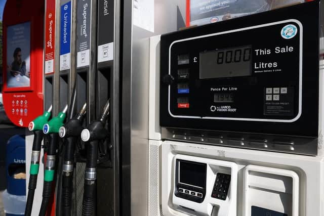 Fuel pumps at a petrol station. (Pic credit: Hollie Adams / Getty Images)