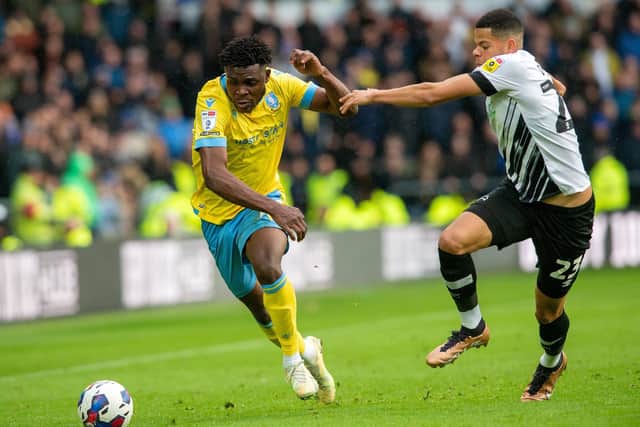 CATCH ME IF YOU CAN: Sheffield Wednesday's Fisavo Dele-Bashiry and Derby County's William Osula battle for the ball during the second-half of Saturday's 0-0 draw at Pride Park. Picture: Bruce Rollinson