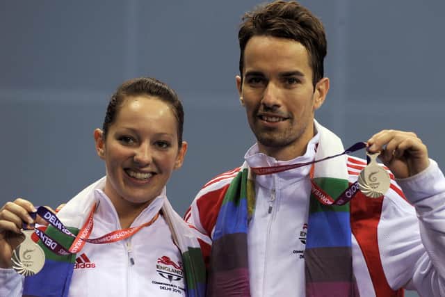 Jenny Wallwork (L) after winning a silver medal with Nathan Robertson in the mixed doubles badminton of the XIX Commonwealth Games at the Siri Fort sports Complex in New Delhi on October 14, 2010. (Picture: INDRANIL MUKHERJEE/AFP via Getty Images)