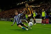 Sheffield Wednesday's Harry Gray and Bradford City's Macaulay Gillesphey battle for the ball during the Sky Bet League One match at Hillsborough Stadium, Sheffield. Picture date: Thursday August 20, 2026.