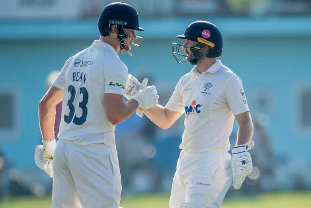 Well done, partner. Adam Lyth, right, and Fin Bean shared their fifth century opening stand for Yorkshire. Picture by Allan McKenzie/SWpix.com