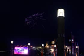Drones fly in the shape of a dragon over Roald Dahl Plass and the Wales Millenium Centre during the Coronation Concert on May 7, 2023 in Cardiff, Wales. (Photo by Polly Thomas/Getty Images)