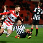 Alfie May, pictured celebrating scoring for Doncaster Rovers in an FA Cup replay against Chorley in November 2018.  Picture: Bruce Rollinson