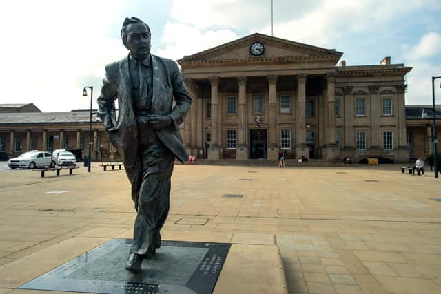 The statue of former Prime Minister Harold Wilson outside Huddersfield Station. PIC: Bruce Rollinson