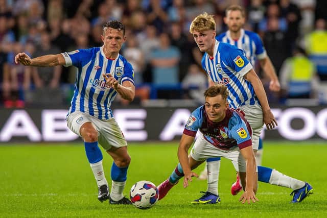 KEEP BELIEVING: Huddersfield Town's Jonathan Hogg (left) is confident the Teriers' fortunes will turn around soon after a tough start to the season. Picture: Bruce Rollinson.