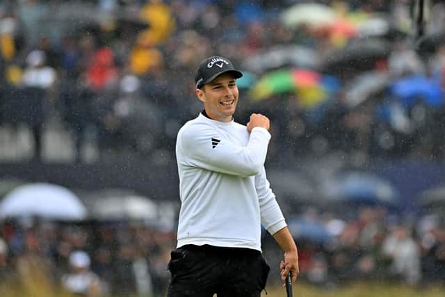 England's Matthew Jordan acknowledges the crowd on the 18th green on day four of the 151st British Open Golf Championship at Royal Liverpool (Picture: GLYN KIRK/AFP via Getty Images)