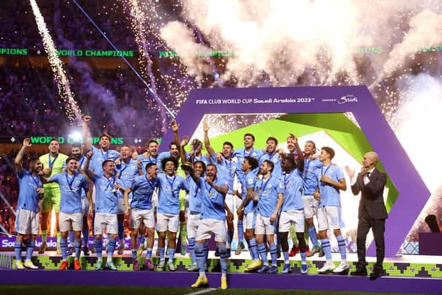 WORLD'S BEST: Manchester City celebrate in Qatar