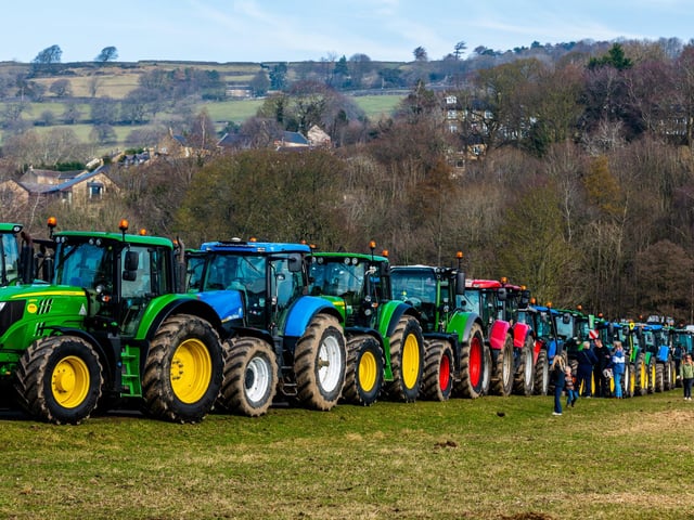 Members of the public walking passed the convoy of tractors parked at Niddedale Showground for a short break before continuing their onward journey to Greenhow, Menwith Hill, Hampsthwaite, Birstwith, Ripley and returning back to Knaresborough. Picture: James Hardisty.