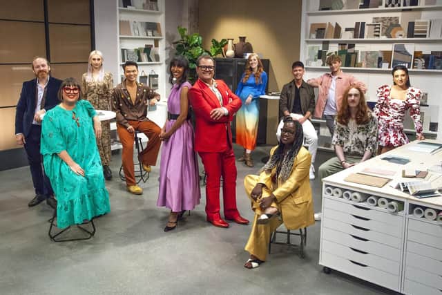 Joanne, far left in the turquoise dress, on the set of Interior Design Masters with fellow contestants, presenter Alan Carr and judge Michelle Ogundehin