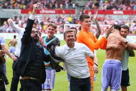COMRADES IN ARMS: Leeds United's director of football Victor Orta celebrates avoiding relegation last season with coach Jesse Marsch