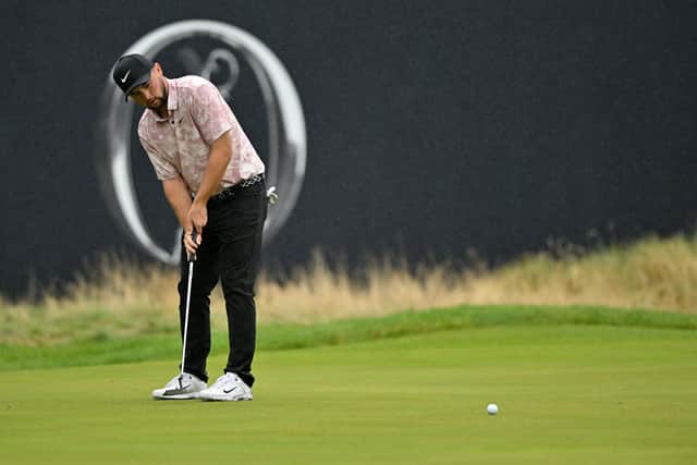 England's Alex Fitzpatrick putts on the 18th green on day four of the 151st British Open Golf Championship at Royal Liverpool Golf (Picture: GLYN KIRK/AFP via Getty Images)