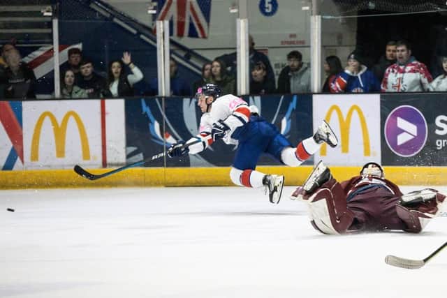IMPACT: Milton Keynes forward Sean Norris scores for GB in the 6-3 defeat against Lastvia in last weekend's warm-up game for the World Championships which get underway in Nottingham on Saturday. Picture courtesy of Ice Hockey UK/Scott Wiggins