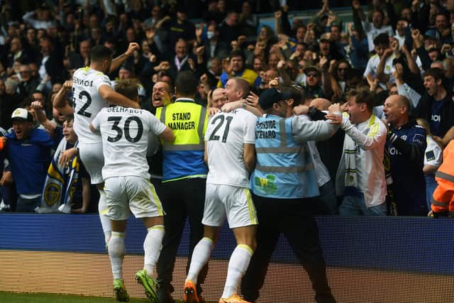 POPULAR: Leeds United's players celebrate with their fans during the Premier League game against Brighton and Hove Albion in May 2022. Jonathan Gawthorpe