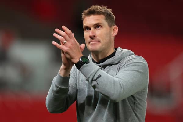 STOKE ON TRENT, ENGLAND - OCTOBER 18: Matt Taylor manager of Rotherham United applauds the fans following the Sky Bet Championship between Stoke City and Rotherham United at Bet365 Stadium on October 18, 2022 in Stoke on Trent, England. (Photo by Nathan Stirk/Getty Images)