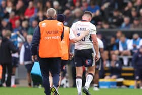 EXETER, ENGLAND - OCTOBER 22:  Owen Farrell, Captain of Saracens leaves the pitch injured during the Gallagher Premiership Rugby match between Exeter Chiefs and Saracens at Sandy Park on October 22, 2022 in Exeter, England. (Photo by Warren Little/Getty Images)