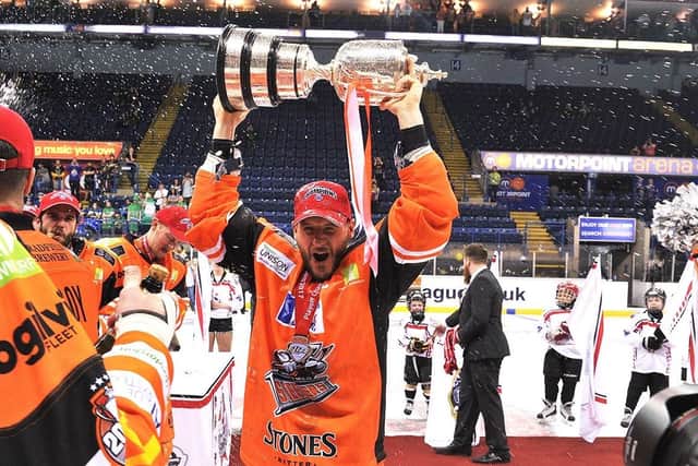 SAME AGAIN PLEASE: Sheffield Steelers' captain Jonathan Phillips celebrates lifting the Elite League play-off trophy back in 2017 after a thrilling victory over Cardiff Devils. Picture courtesy of Dean Woolley.