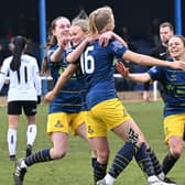 On the up again: Doncaster Rovers Belles players celebrate Arianne Parnham's goal in a recent game with Barnsley as they look to re-establish themselves on and off the pitch. (Picture: Howard Roe/AHPIX LTD courtesy of Doncaster Rovers Belles)