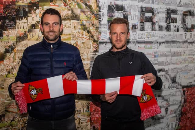 DEBUT: Doncaster-born Danny Schofield, pictured left with Rovers director of football James Coppinger