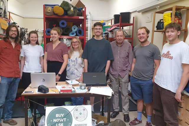 Volunteers at the Buy Nowt LS6 lending library of things in Leeds.