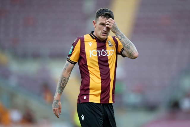 BRADFORD, ENGLAND - AUGUST 09: Andy Cook of Bradford City reacts during the Carabao Cup First Round match between Bradford City and Hull City at University of Bradford Stadium on August 09, 2022 in Bradford, England. (Photo by George Wood/Getty Images)