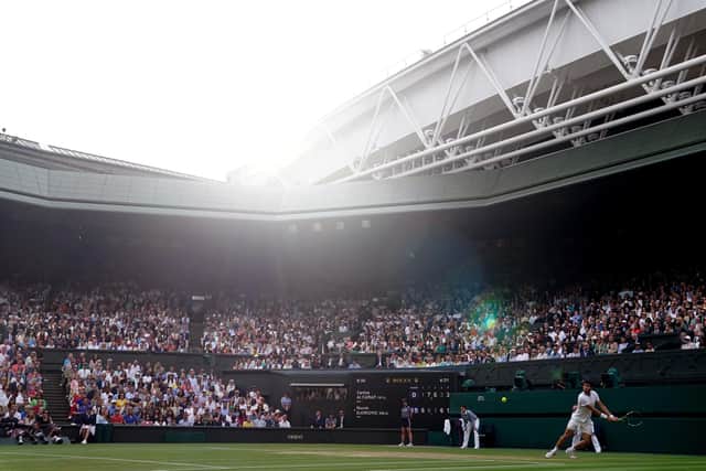 Carlos Alcaraz in action against Novak Djokovic during the men's singles final on day fourteen of Wimbledon. PIC: Adam Davy/PA Wire.