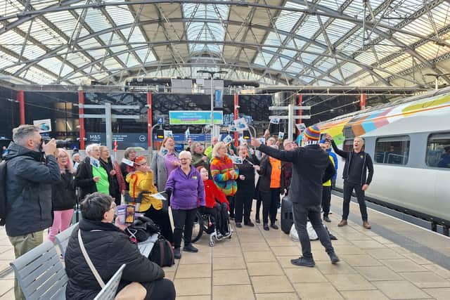 The train was welcomed with a performance from an LGBT+ choir called Proud Marys at Liverpool Lime Street