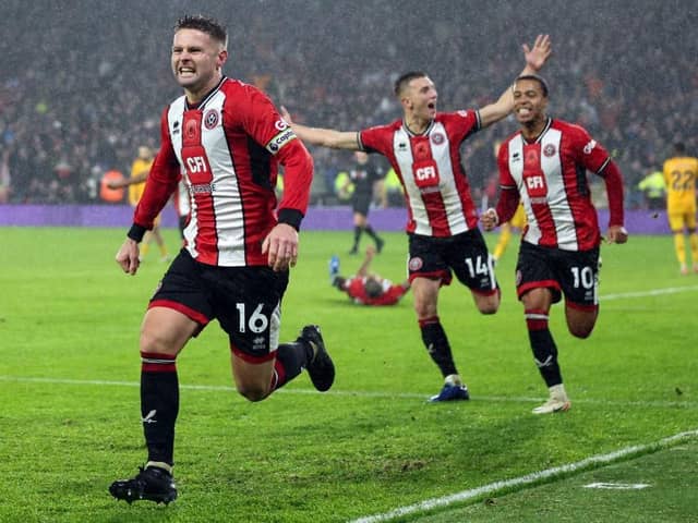 UNHAPPY: Oliver Norwood (far left) says speculation about Sheffield United manager Paul Heckingbottom's job was "disrespectful"