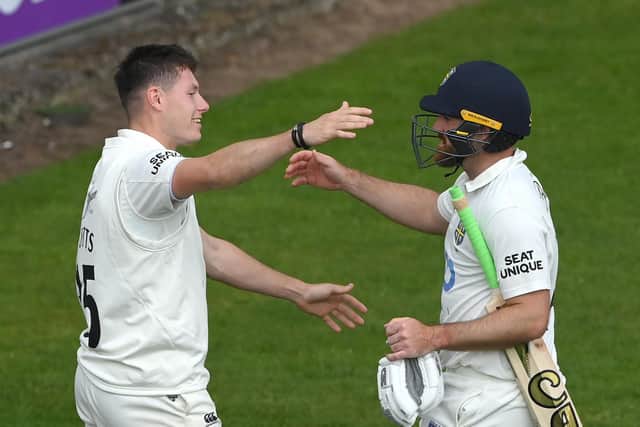 JOB WELL DONE: Ben Raine is congratulated by Matthew Potts after Durham's victory. Picture: Stu Forster/Getty Images.