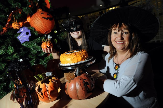 The Place in the Park's Maria Seymour, right, and Caty Surtees get into the spirit of Halloween in 2016.