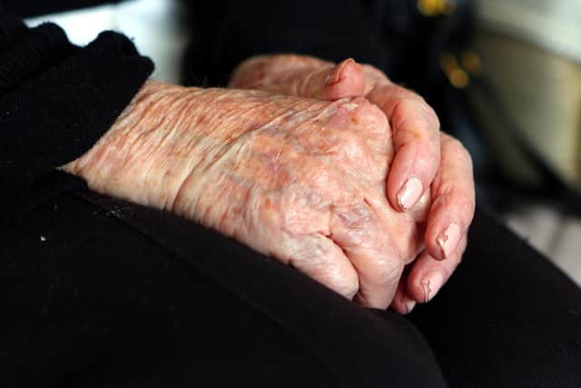 The hands of an elderly woman at a care home. PIC: Peter Byrne/PA Wire