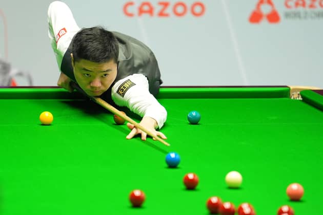 Ding Junhui in action against Jack Lisowski. Photo: Martin Rickett/PA Wire.