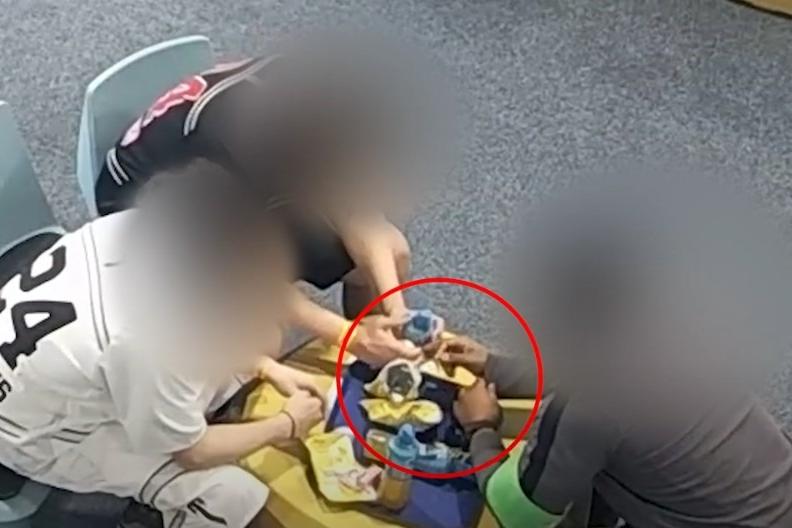 CCTV shows shocking moment man caught smuggling drugs and tobacco into UK prison