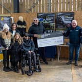 Money raised by the Good Racing Company is handed over to Rob Burrow and his family at an event in Easingwold on Sunday. Megan Dent.