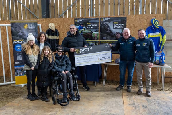 Money raised by the Good Racing Company is handed over to Rob Burrow and his family at an event in Easingwold on Sunday. Megan Dent.