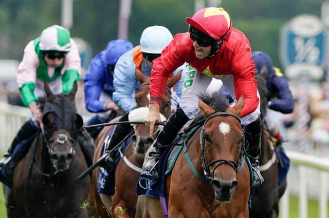YORK, ENGLAND - AUGUST 19: Jason Hart riding Highfield Princess (red) win The Coolmore Wootton Bassett Nunthorpe Stakes at York Racecourse on August 19, 2022 in York, England. (Photo by Alan Crowhurst/Getty Images)